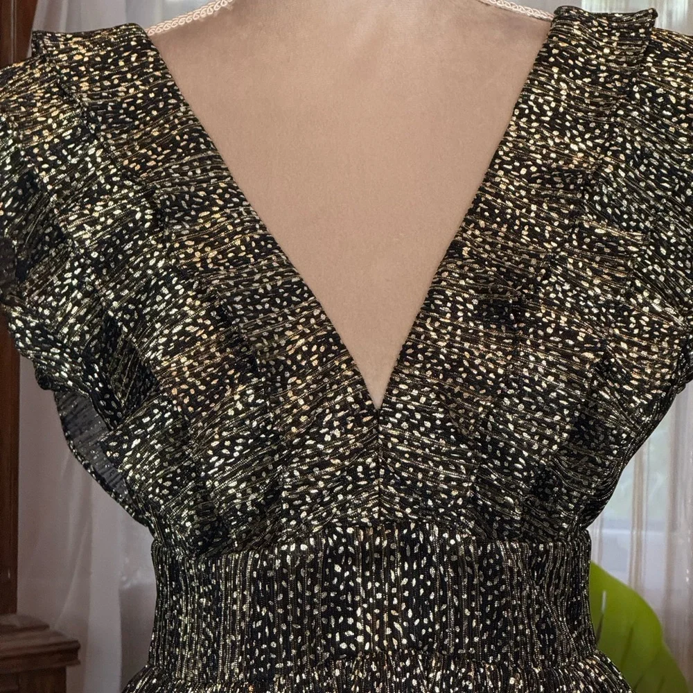 Socialite Mini Dot Ruffled Babydoll Dress in Black and Gold